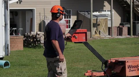 WS operator controlling portable sawmill Stock Footage 40472394