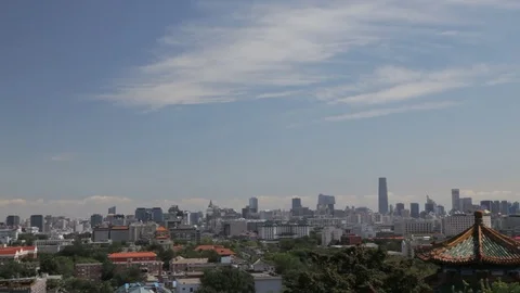 WS PAN Cityscape with old temple rooftop in foreground / Beijing, China Stock Footage 69950413