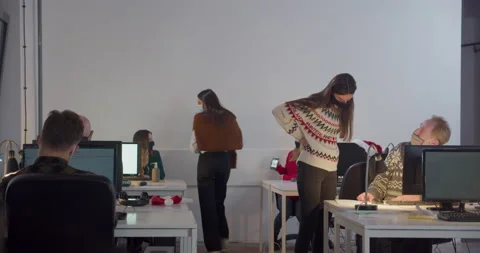 WS People in face masks working in office at night Video stock 144272001