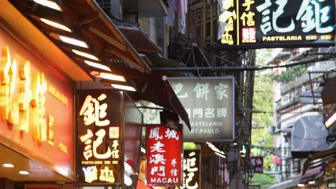 WS TD Crowd of people walking down busy street / Macau, China Stock Footage 69951505