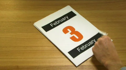 WS, Time lapse, Fast forward turning pages on Calender on office desk Stock Footage 683750