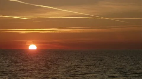 WS T/L View of sea at sunset Stock-Footage 11339865