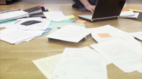 WS TU Man using laptop and talking on cell phone Stock Footage 11291318