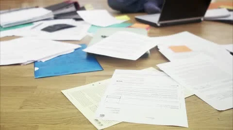 WS TU Man using laptop and talking on cell phone Video stock 11291321