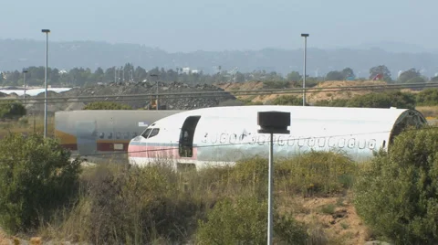 WS Two Old Airplanes in a Plane Graveyard 1 Stock Footage 4280285