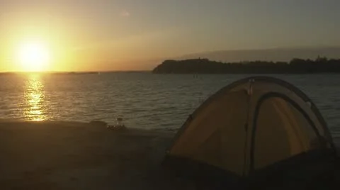 WS View of dome tent by river at sunset / Stockholm Stock Footage 11339504