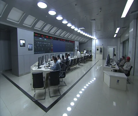 WS workers inside control room at Shenhua Sanhe power station Stockbeeldmateriaal 86746184