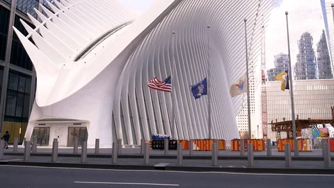 WTC Oculus Windy Halfmast Flags Empty Street Coronavirus Quarantine Lockdown Stock Footage 128661732