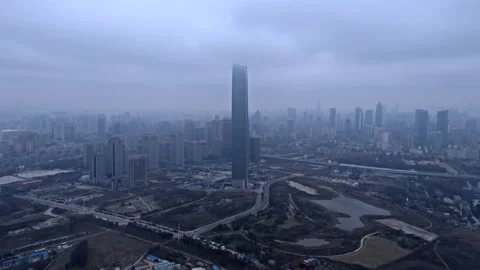 Wuhan Center Tower skyscraper,  CBD, China 4K aerial drone Stock Footage 131831016