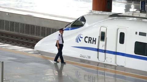 Wuhan China high speed train driver approaches train 動画素材 74486217
