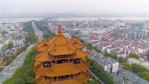 WUHAN, CHINA - MAY 2, 2017: day time wuhan cityscape yellow crane temple aerial Stock-Footage 86859292