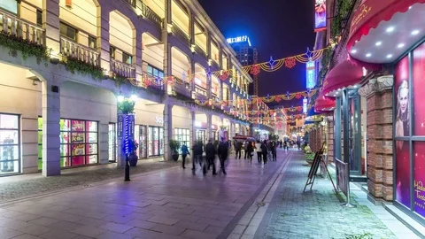 WUHAN - CIRCA December : Time lapse of busy pedestrian mall on Han Road at night 스톡 동영상 74220874