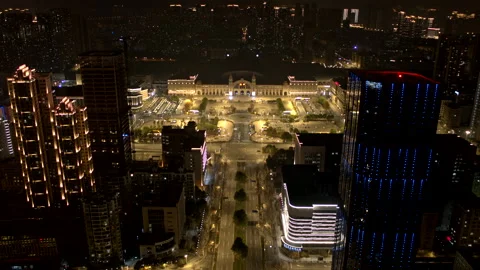 Wuhan empty train station, coronavirus lockdown, 4K drone night Stock Footage 131680182