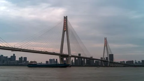 Wuhan Yangtze River Bridge Time-lapse with City Traffic and Flowing Water Stock Footage 326673048
