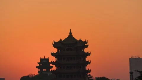 Wuhan Yellow Crane Tower Sunrise Time-lapse with Golden Dawn and City Sky Stock Footage 326680902