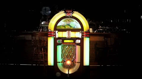 Wurlitzer Jukebox in a dark bar Stock Footage 51163557