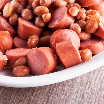 Wurstel and beans Stock Photos
