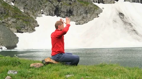 Wushu master trains maritial arts in nature Stock Footage 213244774