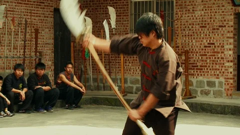 Wushu Warrior showing Skill in Solo Kungfu Fight with Oriental Dagger Video stock 123736827