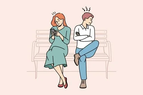 Wütender Mann wendet sich mit Hilfe eines Mobiltelefons von einer verrückt. 写真素材