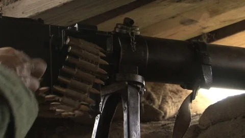 WW1 German Machine Gun fires from smoky Western Front Trenches Stock Footage 81523764