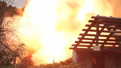 WW2 Bunker explodes after a grenade is thrown into it - Fire, smoke and flame Vídeos de archivo 105452652