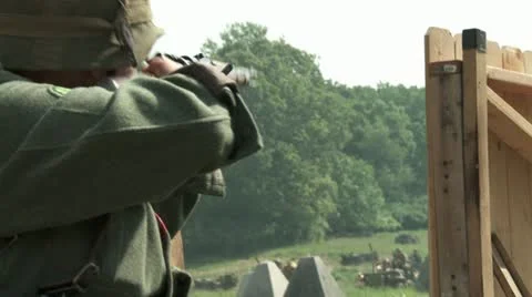 WW2 German fires from cover Stock Footage 11139744