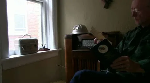 WWII Civilian Worker, news of the war Stock Footage