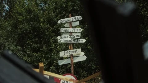 WWII Eastern Front Scene. German Military checkpoint with wooden Signpost points Stock-Footage 306366876