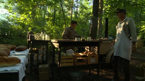 WWII German Field Kitchen preparing food Stock Footage 52372135