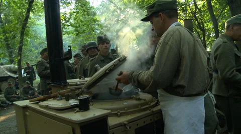 WWII German Field Kitchen serving food to soldiers 3 Stock Footage 52373087