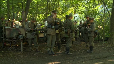 WWII German Field Kitchen serving food to soldiers 6 Stock Footage 52373309