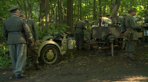 WWII German Field Kitchen serving food to soldiers 7 Stock Footage 52373418