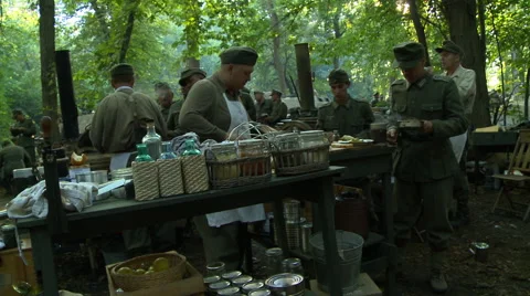 WWII German Field Kitchen serving food to soldiers Stock Footage 52373705