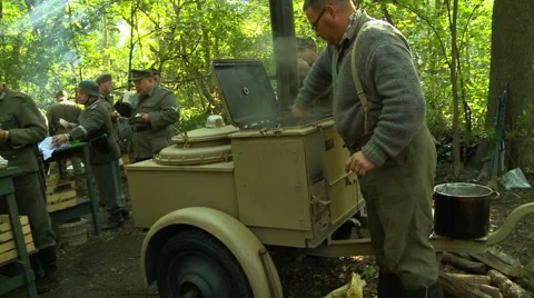 WWII German Field Kitchen serving food Stock Footage 52374338