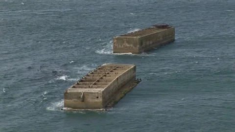 WWII Phoenix blocks remnants Normandy, France Video stock 101208533