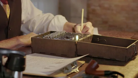 WWII scientist working on breaking the Enigma machine code Video stock 263158069