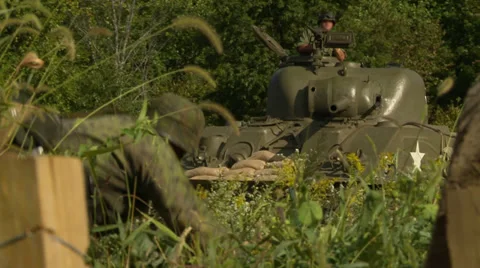 WWII Sherman tank attacks 2 Stock Footage 33656496