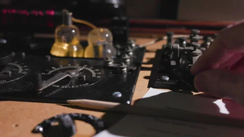 WWII spy sending Morse code from his transmitter Stock Footage 295457429