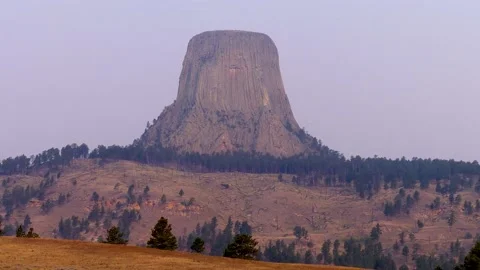 Wyoming, Devils Tower  A long distance view of Devils Tower sticking out of Stock Footage 160569280