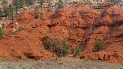 Wyoming, Devils Tower  A pan left to right across the red rock formation nea Stock Footage 160568844