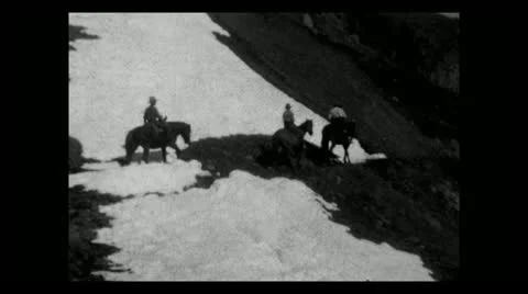 Wyoming pack train crossing snow 1935 B-W 動画素材 12738237