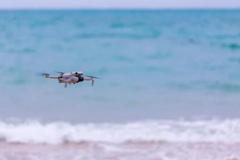 X-default Camera Drone Hovering Over an Okinawa Beach Stock Photos
