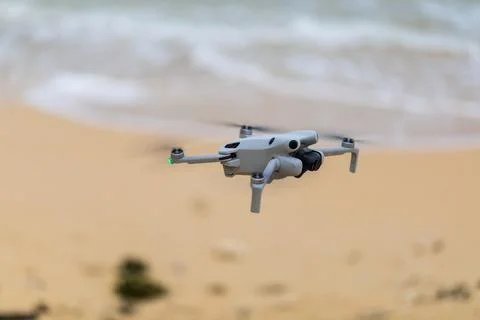 X-default Camera Drone Hovering Over an Okinawa Beach Stock Photos