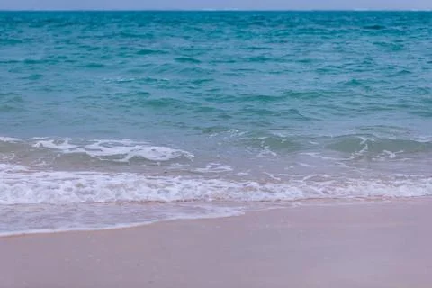 X-default Gentle Waves Reaching a Quiet Okinawa Sandy Beach Stock Photos