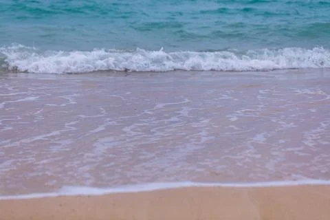 X-default Gentle Waves Reaching a Quiet Okinawa Sandy Beach Stock Photos