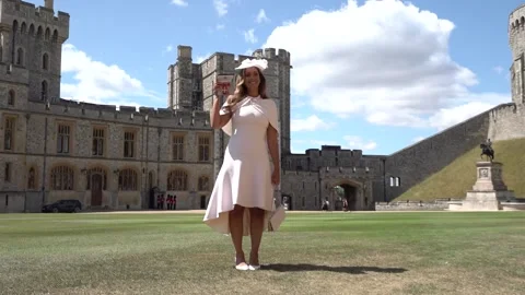 X Factor winner Leona Lewis made an OBE at Windsor Castle Stock Footage 313206559