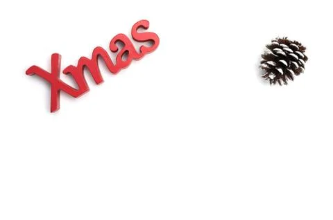 X-mas text and  pine cone on white background Stock Photos