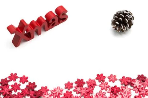 X-mas text and  pine coneon, red snow flower decoration white background Stock Photos