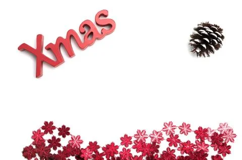 X-mas text and  pine coneon, red snow flower decoration white background Stock-Fotos
